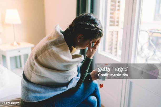 staying home with flu virus - pandemic illness stock pictures, royalty-free photos & images