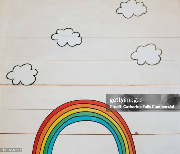 rainbow on a wall - love valour compassion stock pictures, royalty-free photos & images