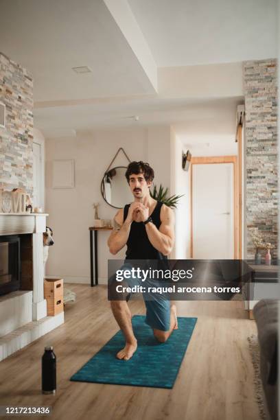 adult man practicing sport at modern home at morning - corpo normale foto e immagini stock