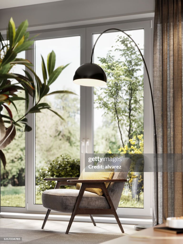 Computer generated image of arm chair in living room