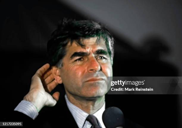 Democratic Presidential candidate Governor Michael Dukakis talks to crowd of supporters on a farm in rural Illinois during a campaign stop on his...