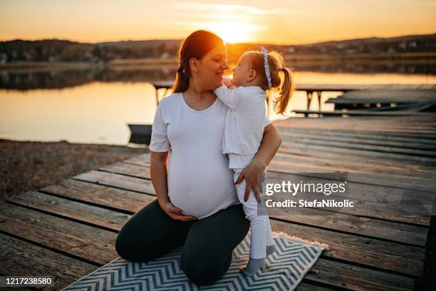be relaxed with mum - sun deck stock pictures, royalty-free photos & images