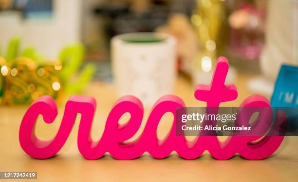 word “create” pink cursive wooden word decor for home or business office - desk toy 個照片及圖片�檔