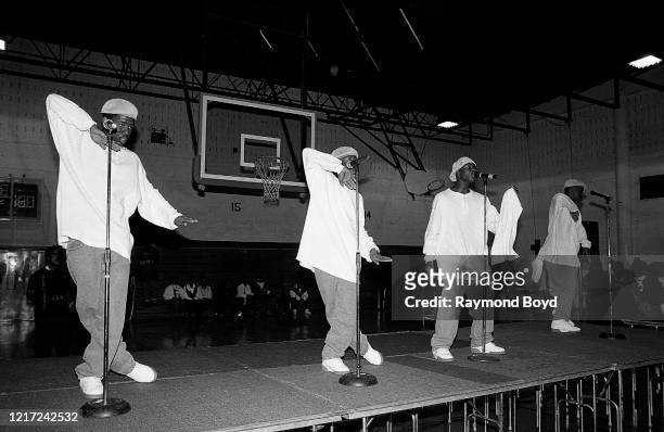 Singers Trerail Puckett, Roy Jones, Eric McNeal and Keith Thomas of Subway performs at Englewood High School in Chicago, Illinois in November 1995. "n