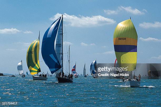 yachts racing downwind in the solent - spinaker stock pictures, royalty-free photos & images