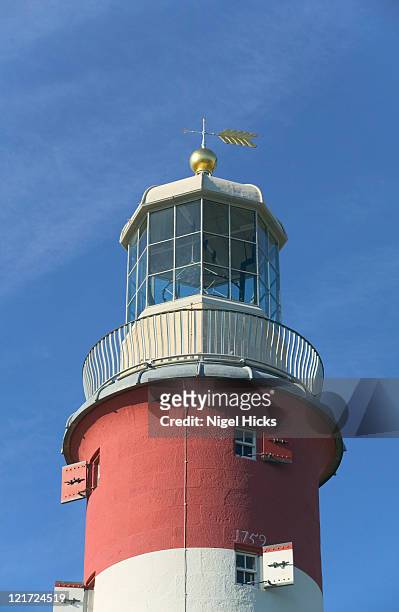 close-up of smeaton's tower, now on plymouth hoe the lighthouse was first built nearly 250 years ago and once stood 14 miles offshore guiding ships away from the treacherous eddystone rocks - plymouth hoe stock pictures, royalty-free photos & images