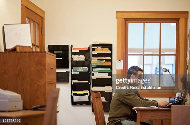Filing Foreman Foreman Laptop Photos and Premium High Res Pictures - Getty Images