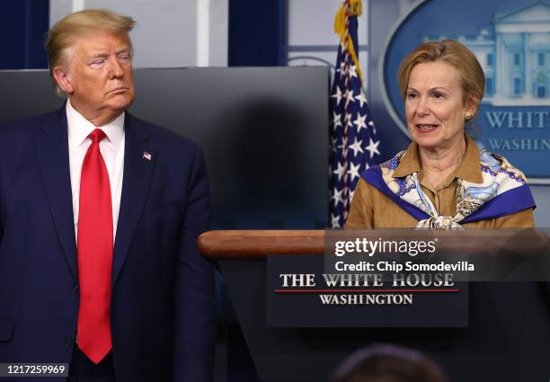 White House coronavirus response coordinator Deborah Birx speaks while flanked by U.S. President Donald Trump following a meeting of his coronavirus...