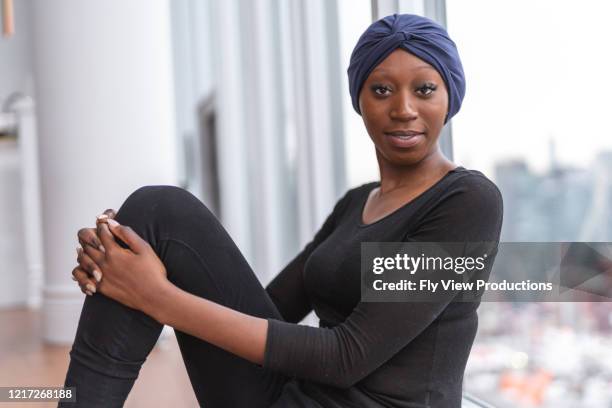 portrait of beautiful african american women with cancer - black bandana stock pictures, royalty-free photos & images