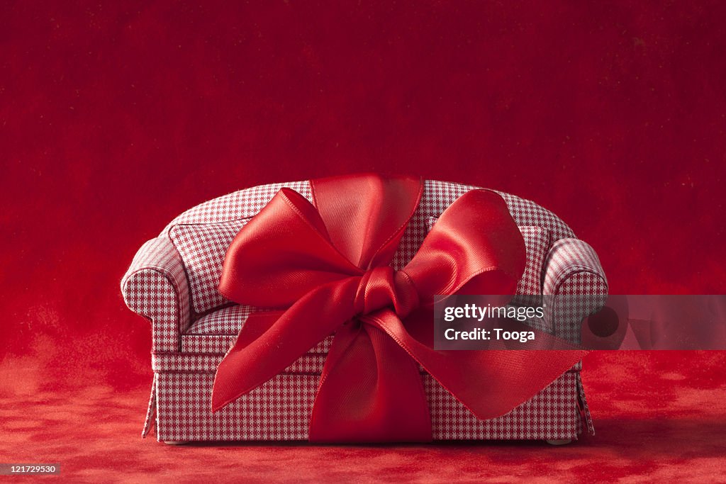 Red check couch with red bow