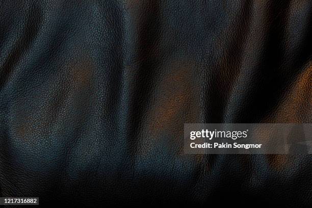 close up black leather and texture background. - black leather texture stock-fotos und bilder