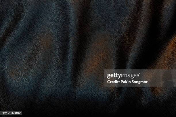 close up black leather and texture background. - leather fotografías e imágenes de stock