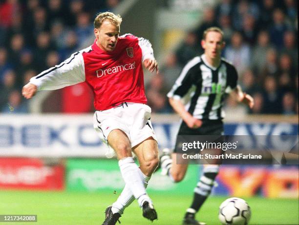 Dennis Bergkamp scores a goal for Arsenal during the Premier League match between Newcastle United and Arsenal on March 2, 2002 in Newcastle, England.