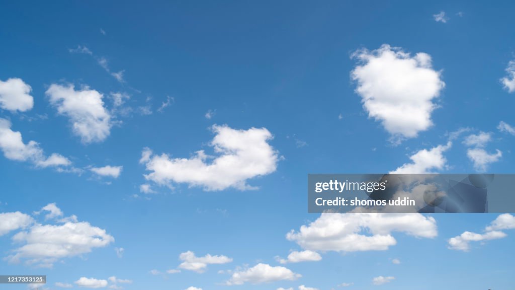 White colour clouds against blue sky