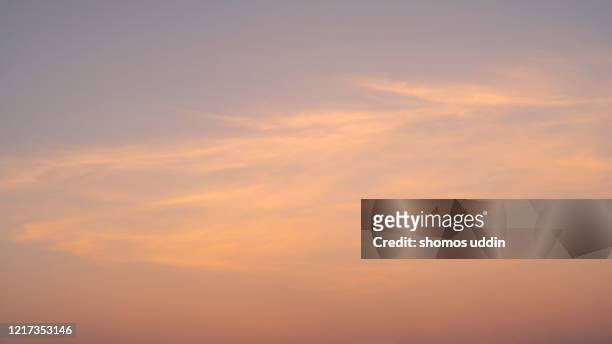 peach and pink sky - peach tranquility stock pictures, royalty-free photos & images