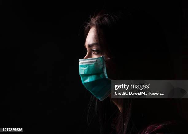 Masking Sad Sad Woman Face Mask Photos and Premium High Res Pictures - Getty Images