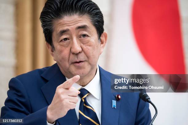 Japan's Prime Minister Shinzo Abe speaks during a press conference at the prime minister's official residence on April 07, 2020 in Tokyo, Japan. The...