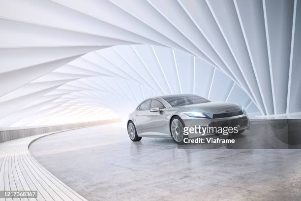 electric car tunnel v4 - modern car stock pictures, royalty-free photos & images