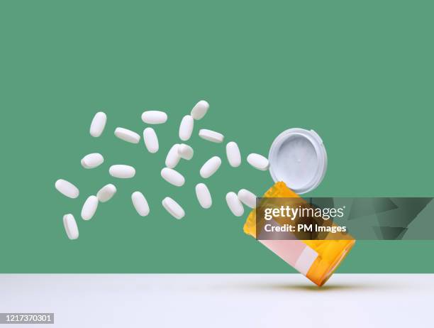 falling pills - fall prevention stock pictures, royalty-free photos & images