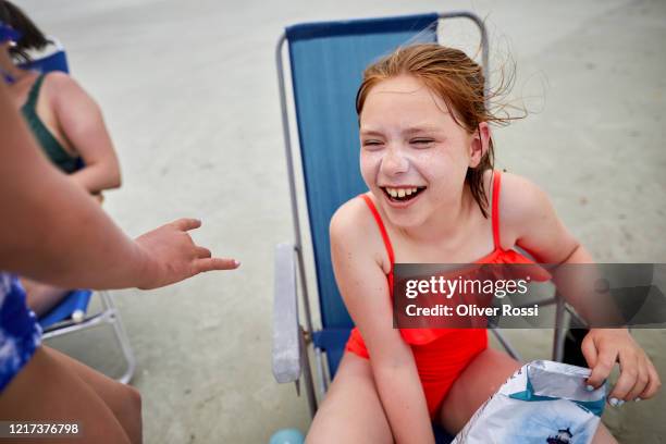 Swimwear And Young Girls And Resting Photos and Premium High Res Pictures -  Getty Images
