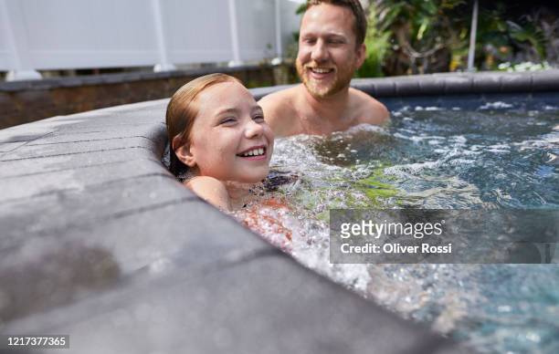happy father and daughter in a hot tub - girls in hot tub stockfoto's en -beelden