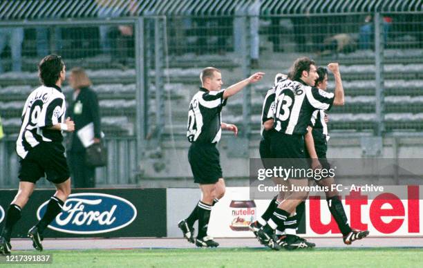 Alessandro Del Piero of Juventus celebrates with team mates after scoring a goal during the UEFA Champions League Semi-Final match between Juventus...