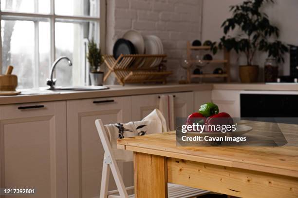 fresh farmers tomatoes and basil on wood table. - rustic dining room stock pictures, royalty-free photos & images