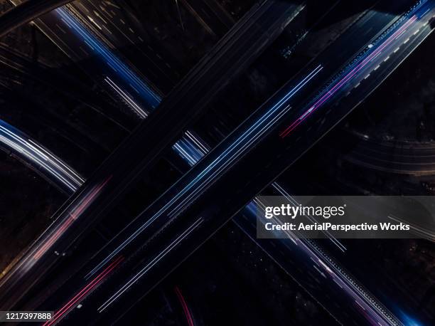 aerial view of overpass and city traffic at rush hour - car road imagens e fotografias de stock