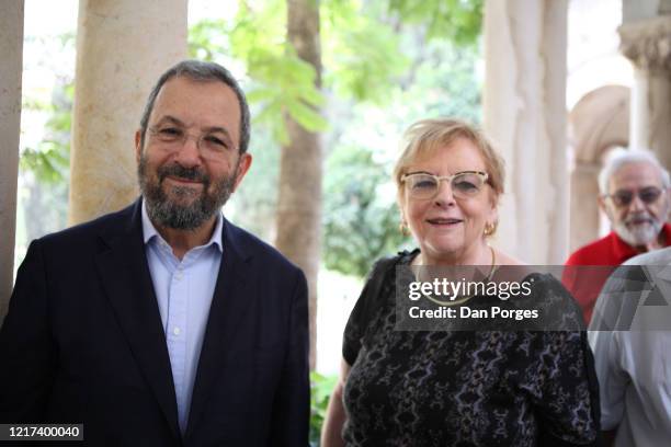 Portrait of former Israeli Prime Minister Ehud Barak and former President of the Israel Supreme Court Dorit Beinisch as they pose together during the...