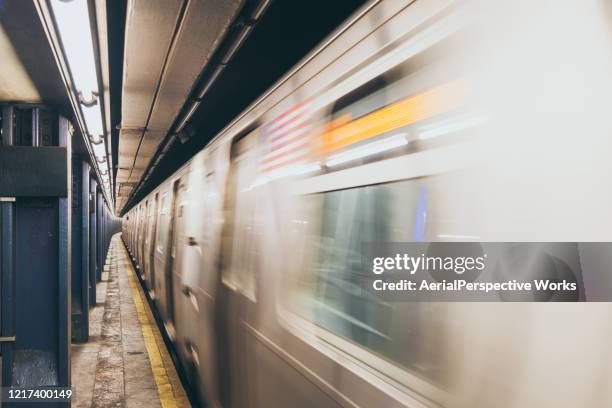 motion blur view of nyc subway train - generic location stock pictures, royalty-free photos & images