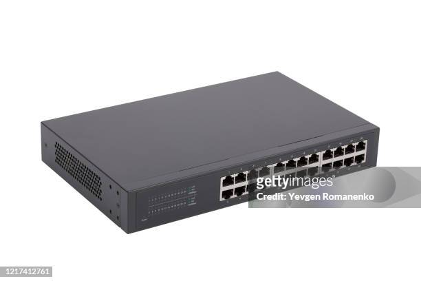 ethernet gigabit desktop switch with 24 ports isolated on white background - calota - fotografias e filmes do acervo