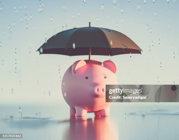 piggy bank,3d rendu - se protéger de la pluie photos et images de collection