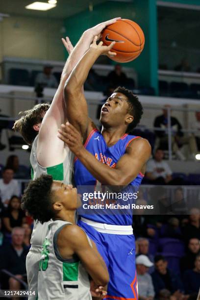 Zion Harmon of Marshall County High School in action against Fort Myers High School during the City of Palms Classic Day 1 at Suncoast Credit Union...