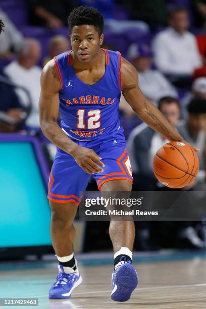 Zion Harmon of Marshall County High School in action against Fort Myers High School during the City of Palms Classic Day 1 at Suncoast Credit Union...