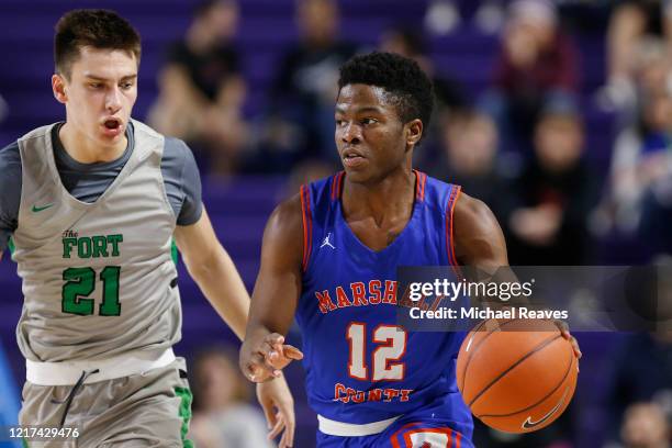 Zion Harmon of Marshall County High School in action against Fort Myers High School during the City of Palms Classic Day 1 at Suncoast Credit Union...