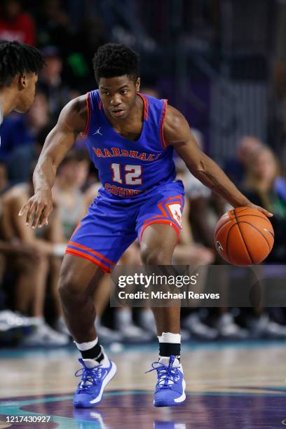 Zion Harmon of Marshall County High School in action against Fort Myers High School during the City of Palms Classic Day 1 at Suncoast Credit Union...