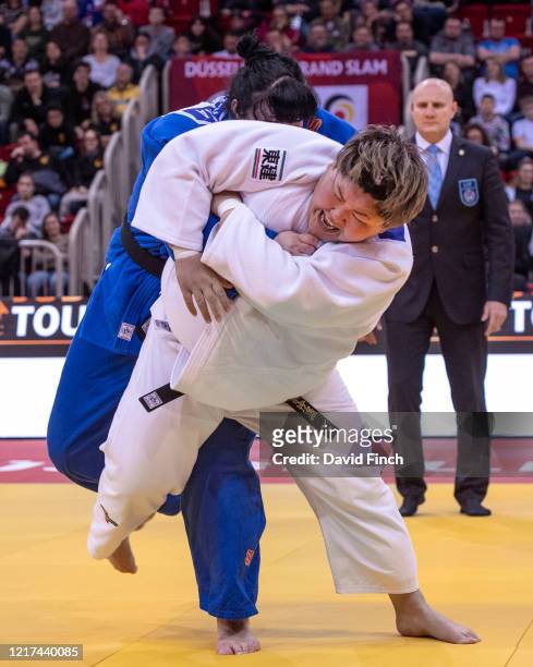 Watched by referee Evgeny Rakhlin of Russia, twice senior World champion, Sarah Asahina of Japan attacks Iryna Kindzerska of Azerbaijan. Asahina...