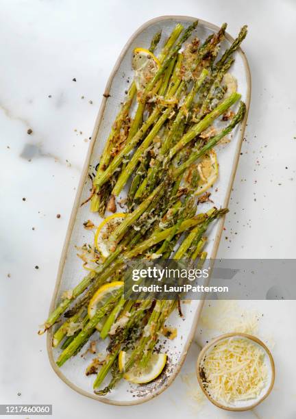 lemon, garlic and parmesan roasted asparagus - asparagus stock pictures, royalty-free photos & images