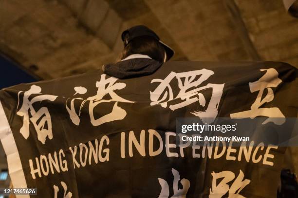 Pro-democracy activist takes part in a rally on the eve of Tiananmen Square Massacre candlelight vigil commemoration outside of the Lai Chi Kok...