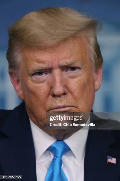 President Donald Trump speaks to reporters following a meeting of the coronavirus task force in the Brady Press Briefing Room at the White House on...