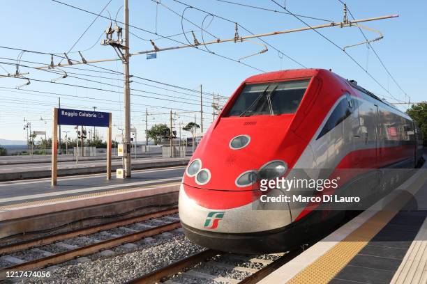 The first Freccia Rossa high speed long haul train connecting Turin and Reggio Calabria in the history of the Italian railway system arrives at the...