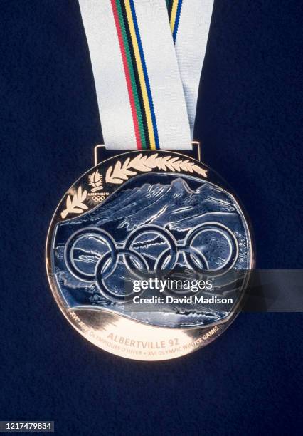 Closeup view of an Olympic Gold Medal awarded during the 1992 Olympic Games held in Albertville, France.