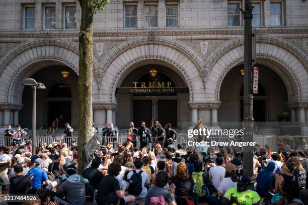 Demonstrators peacefully protest outside of Trump International Hotel Washington on Pennsylvania Avenue on June 3, 2020 in Washington, DC. Protests...