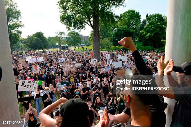 Organizers rally the people who attended a "Black Lives Matter" rally and march at Boston Common, in response to the death of George Floyd and other...