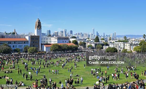 Protesters gather for a rally supporting George Floyd at Dolores Park in San Francisco, California on June 3, 2020. - Thousands of people gathered at...