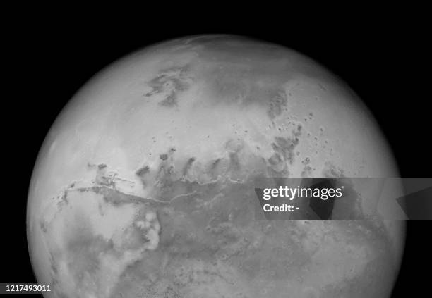 This view of Mars released 27 August, 2003 from the Hubble Space Telescope's new Advanced Camera for Surveys provides the sharpest view of the red...