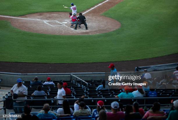 Fans in the bleachers during a baseball game of Nicaragua's National League between Cafeteros del Carazo and Leones de León at Estadio Nacional...