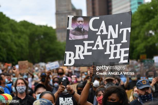 Protesters gather to demonstrate the death of George Floyd on June 4 in New York. - On May 25 Floyd, a 46-year-old black man suspected of passing a...