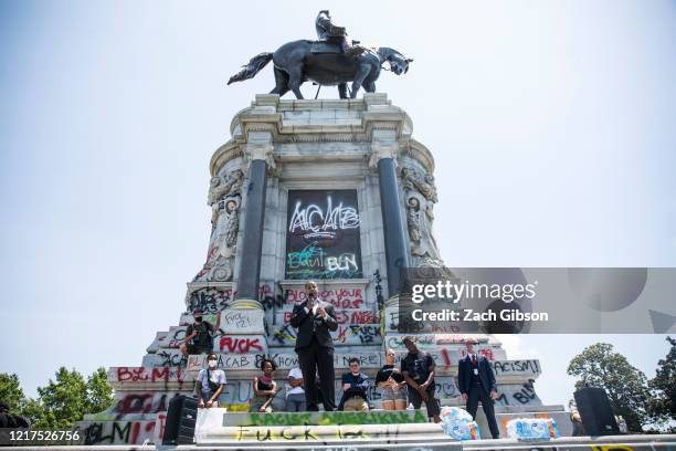 Virginia Lieutenant Gov. Justin Fairfax speaks to demonstrators in front of a statue of Confederate General Robert E. Lee is pictured on June 4, 2020...