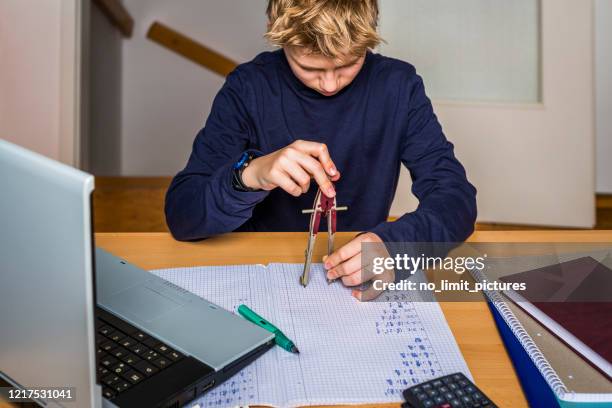 Doing Math Gi 879 A Teenager With A Calculator Stock Photos, High-Res Pictures, and ...